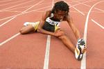Runner stretches before a race.