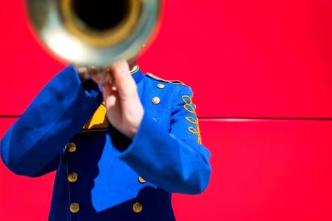 Person playing trumpet