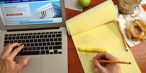 Laptop and notepad