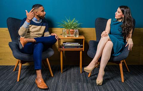 Two people talking