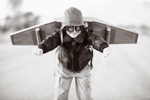 Kid with wooden wings
