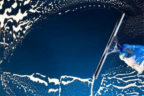 Squeegee cleaning window