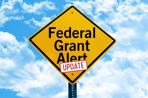 Traffic sign: Federal Grant Alert Update