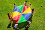 Kids with parachute circle